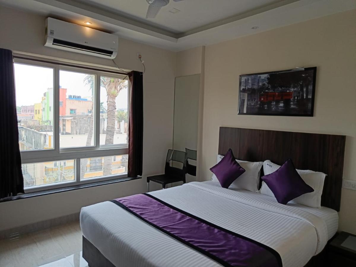 Sheldon Inn Kolkata Bagian luar foto