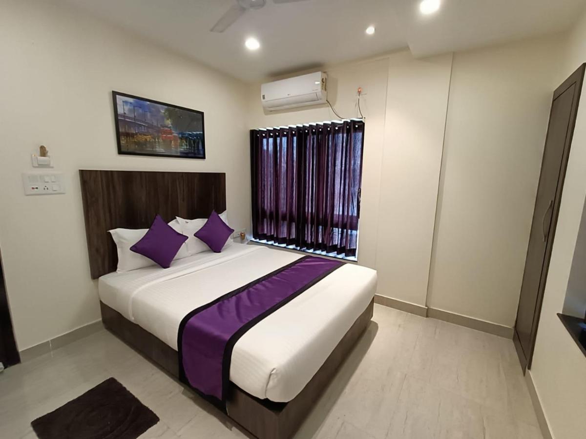 Sheldon Inn Kolkata Bagian luar foto