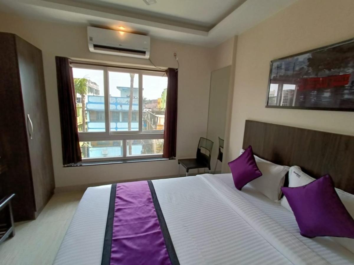 Sheldon Inn Kolkata Bagian luar foto
