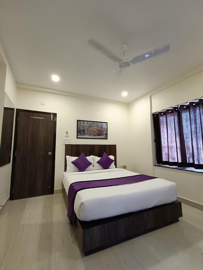 Sheldon Inn Kolkata Bagian luar foto