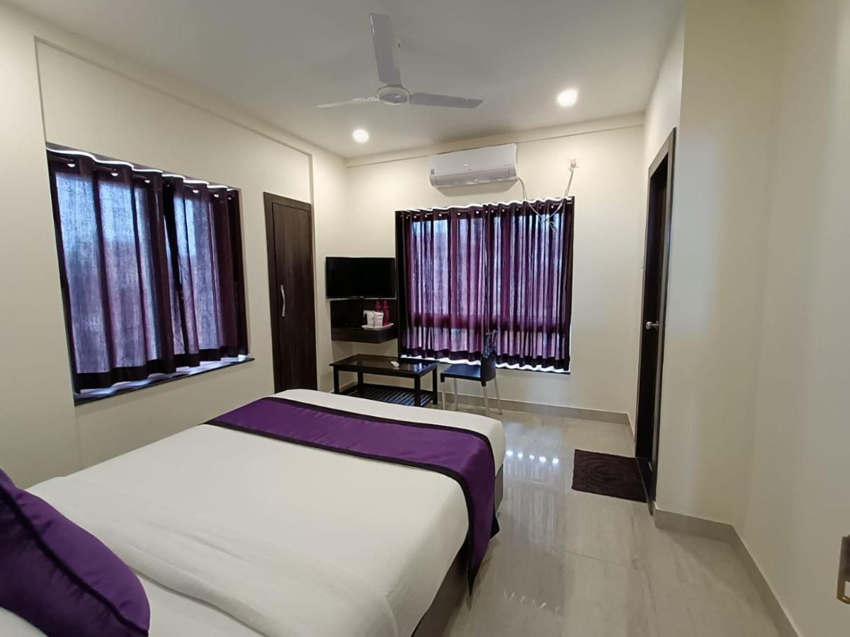 Sheldon Inn Kolkata Bagian luar foto