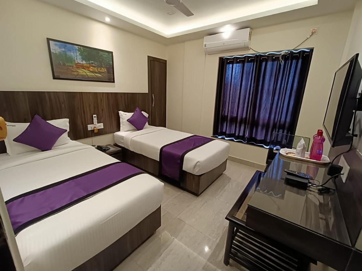 Sheldon Inn Kolkata Bagian luar foto