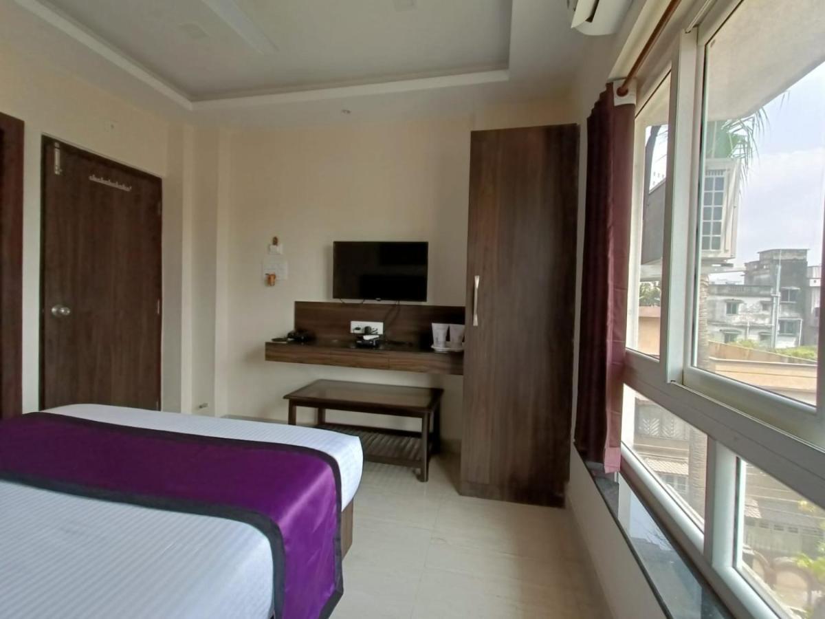 Sheldon Inn Kolkata Bagian luar foto