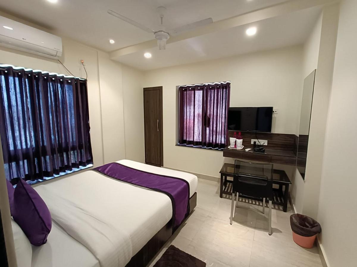Sheldon Inn Kolkata Bagian luar foto